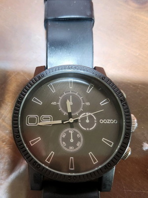 Oozoo watch used with black strap