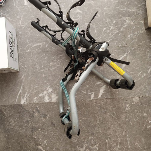 Car bike rack used with three positions and straps for two