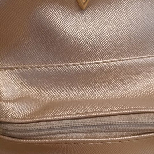 Small backpack used, beige gold