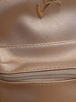 Small backpack used, beige gold