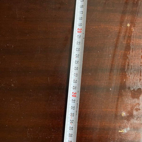 Wooden black shelf used with minor wear