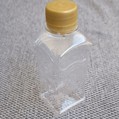 Holy water bottle like new with Christ and Virgin Mary figures