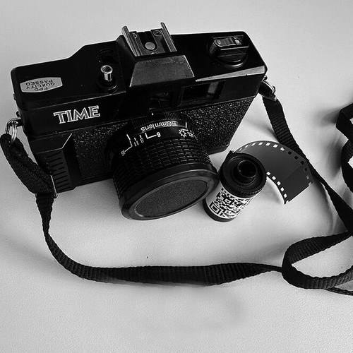 Time Film Camera used, vintage 1980s–1990s design