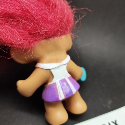 Troll Tennis Player figure with fuchsia hair and eyes