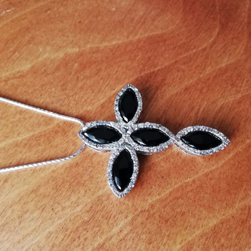 Silver cross 925 like new with white and black zircon