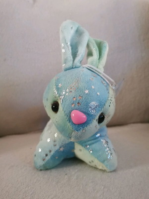 Plush multicolored bunny with suction cup like new