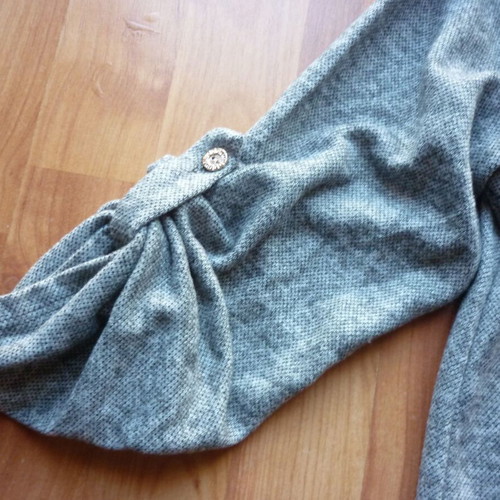 Women's blouse M/L gray like new, long back with hanging details