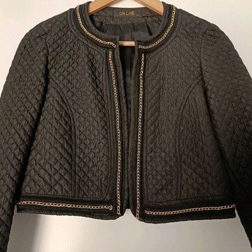Short quilted jacket Online size small like new, black with gold chain