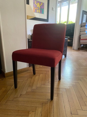 Dining chair used, wood with dark orange-red fabric