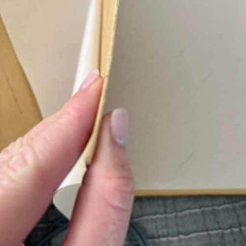 Photo album used with recycled paper, wood and natural leaf