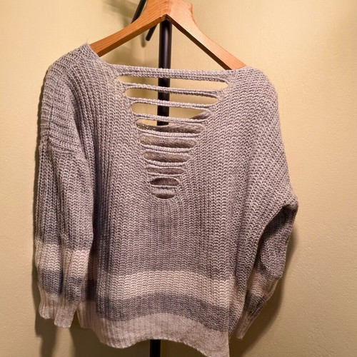 Knitted grey and white sweater with back design, like new