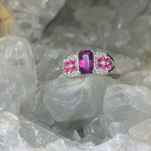 Silver ring with natural rhodolite garnet and moissanite