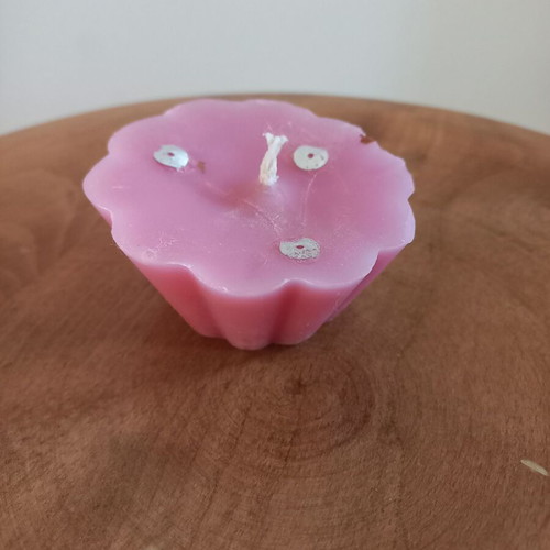 Pink candle like new, flower shape, light rose scent