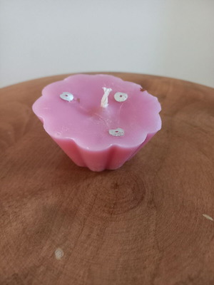 Pink candle like new, flower shape, light rose scent