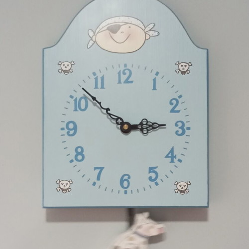 Blue wall clock used for kids room with pirate and dog design