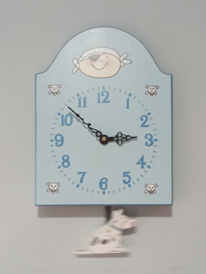 Blue wall clock used for kids room with pirate and dog design