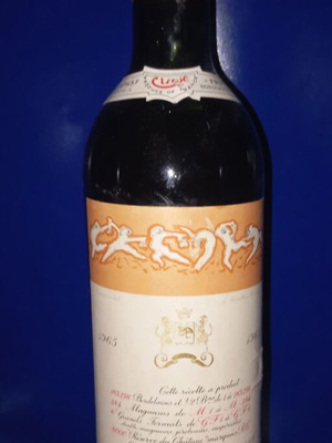 Chateau Mouton Rothschild 1965 vintage wine bottle used