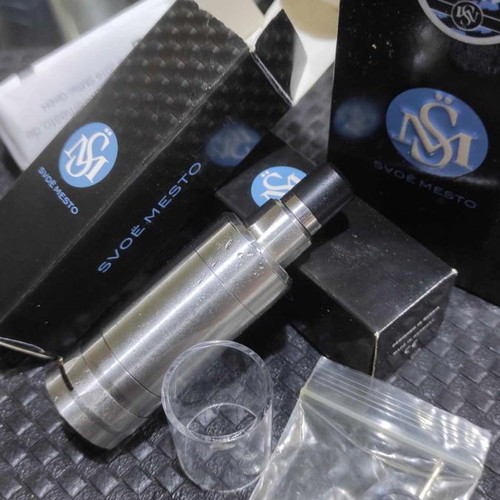 Kayfun V5 atomizer used with glass and steel tank