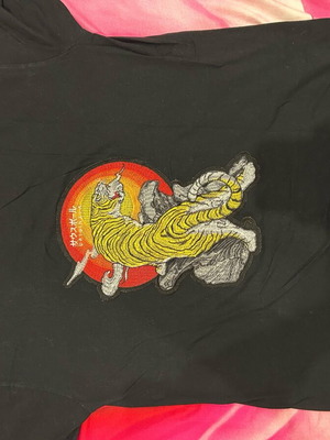Japanese t shirt like new, black with back design, sizes L and XL