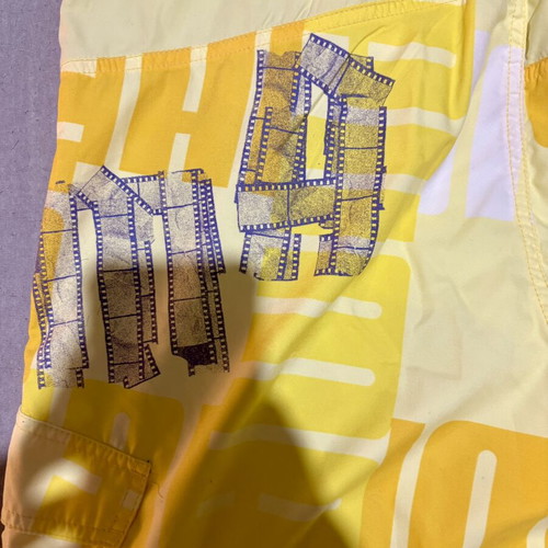 Puma men's yellow swim shorts, new