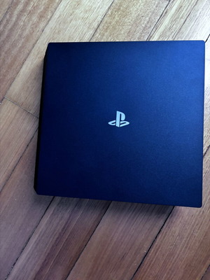 PlayStation 4 Pro 1 TB like new with 2 controllers