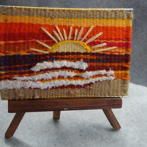 Woven sun used on wooden tripod