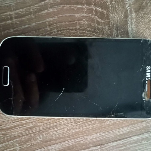 Samsung S4 Mini used, broken screen, unknown condition