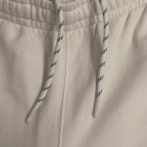 Lacoste joggers white with blue stripe