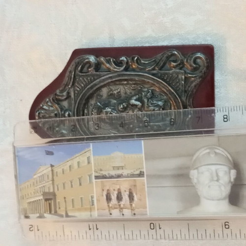 Silver icon 925 on wooden base