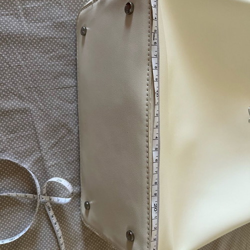Axel shoulder bag white like new with unused strap