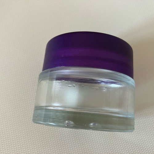Empty 50 ml container made of thick glass, like new