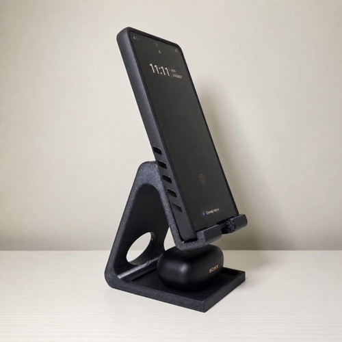 3D Phone Stand with Earphone Holder like new
