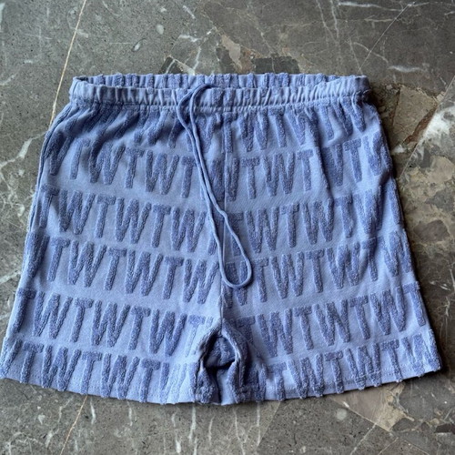 Blue shorts with letter textures like new