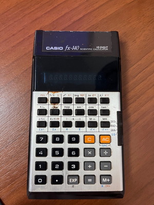 Casio fx-140 μεταχειρισμένη vintage επιστημονική αριθμομηχανή με πράσινη VFD οθόνη