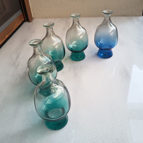 Glass bottles set of 5, 4 green and 1 blue, no corks