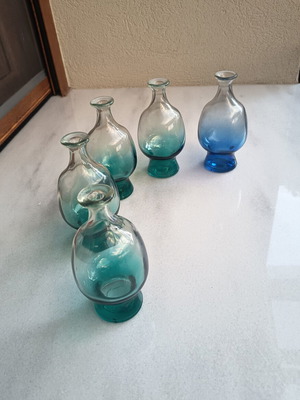 Glass bottles set of 5, 4 green and 1 blue, no corks