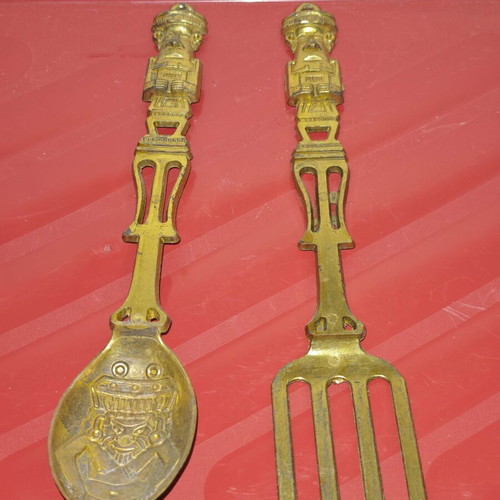 Vintage brass serving spoon and fork set with Aztec motifs