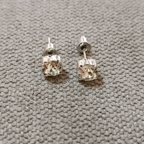 Set of six pairs of earrings new, three dangling and three small