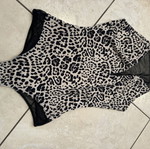 Animal print one-piece swimsuit with black mesh details