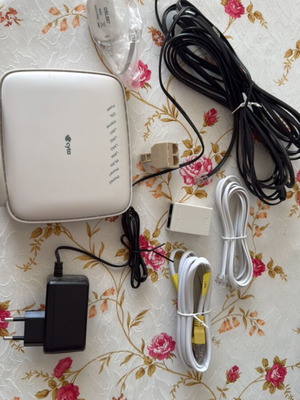 Router modem with unused telephone and LAN cables, like new