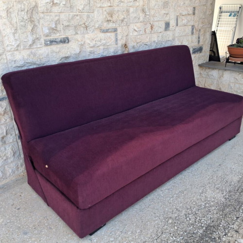 Two-seater sofa with storage compartment