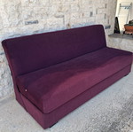 Two-seater sofa with storage compartment