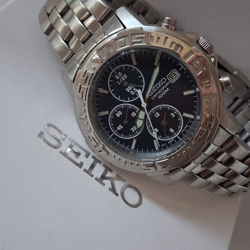 Seiko Quartz Japan Chronograph Alarm watch used, blue dial, silver bracelet