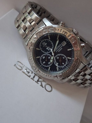 Seiko Quartz Japan Chronograph Alarm watch used, blue dial, silver bracelet