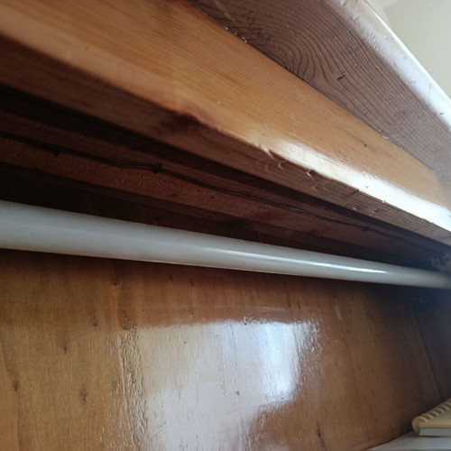 Wooden desk with drawers and light