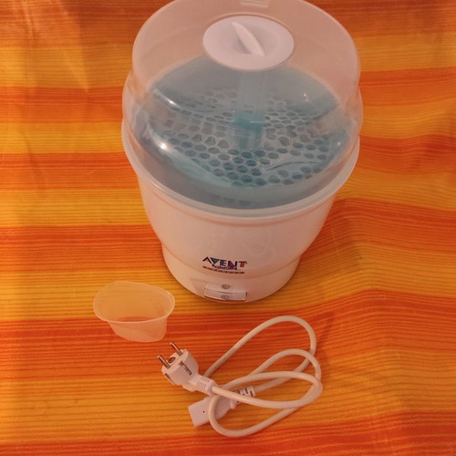 Bottle sterilizer used, capacity for 4 bottles