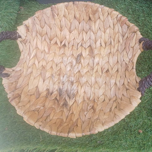Wicker basket with black handles used