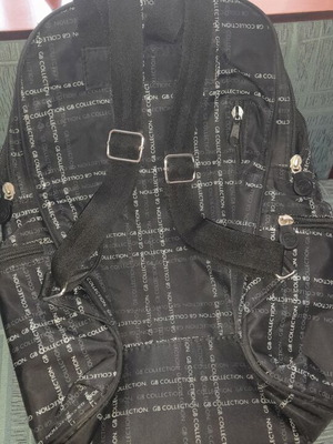 Backpack with multiple compartments, like new, black