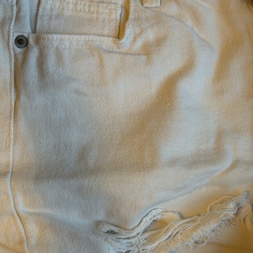 White denim shorts used, size small with distressed details