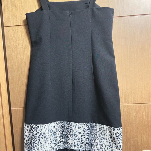 Dress used with silk feather details on hem, black and white, size L